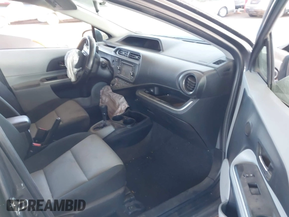 2014 Toyota Prius One with VIN JTDKDTB38E1572456, listed as a IAAI auction lot 41975766 with 88,075 mi miles and . Bid and sale history available at DreamBid. Image 5.