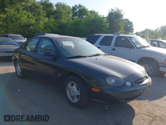 1999 Ford Taurus SE Comfort z VIN 1FAFP53S3XG104165, wystawiony jako IAAI lot #42234147 z przebiegiem 183 124 mil mil oraz . Historia ofert i sprzedaży dostępna na DreamBid. Obrazek 1.