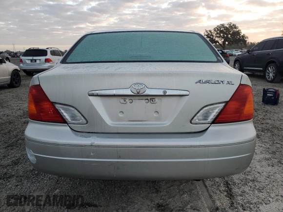 2002 Toyota Avalon XL with VIN 4T1BF28B32U263941, listed as a Copart auction lot 83993504 with 118,438 mi miles and Salvage Title. Bid and sale history available at DreamBid. Image 6.