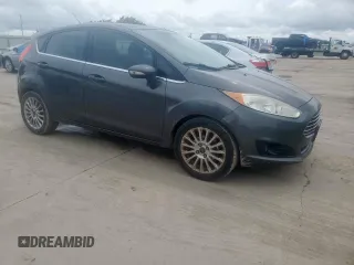 2015 Ford Fiesta Titanium z VIN 3FADP4FJ5FM203174, wystawiony jako Copart lot #60727515 z przebiegiem 91 898 mil mil oraz Czysty tytuł • Clean title. Historia ofert i sprzedaży dostępna na DreamBid. Obrazek 4.