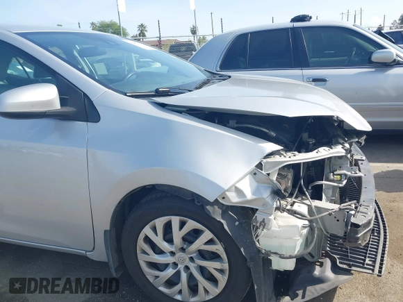2019 Toyota Corolla L with VIN 2T1BURHE2KC190975, listed as a IAAI auction lot 41901370 with 94,925 mi miles. Bid and sale history available at carsss.com. Image 19.