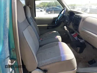 1995 Ford Ranger XL with VIN 1FTCR14A7SPA27802, listed as a IAAI auction lot 42020196 with 169,203 mi miles. Bid and sale history available at carsss.com. Image 5.