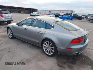 2014 Audi A7 Premium Plus z VIN WAUWGAFC9EN096702, wystawiony jako IAAI lot #41202201 z przebiegiem 103 893 mil mil oraz . Historia ofert i sprzedaży dostępna na DreamBid. Obrazek 3.
