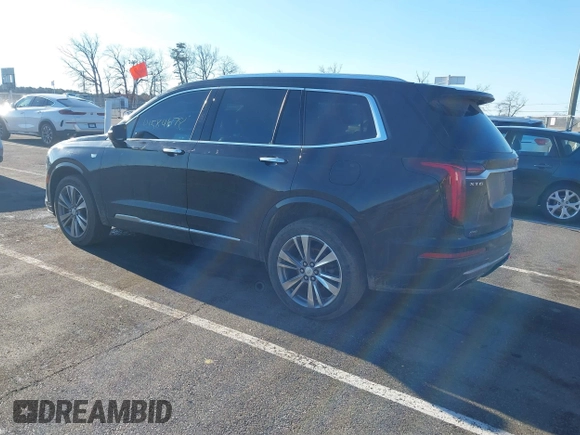 2022 Cadillac XT6 Premium Luxury with VIN 1GYKPDRS5NZ122060, listed as a IAAI auction lot 41584678 with 36,036 mi miles. Bid and sale history available at carsss.com. Image 3.