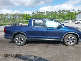 2019 Honda Ridgeline RTL-E with VIN 5FPYK3F76KB010613, listed as a IAAI auction lot 42079810 with 90,492 mi miles and . Bid and sale history available at DreamBid. Image 13.