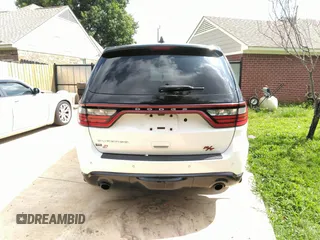 2018 Dodge Durango Special Service with VIN 1C4SDJFT4JC317011, listed as a IAAI auction lot 42717061 with 124,663 mi miles and . Bid and sale history available at DreamBid. Image 16.