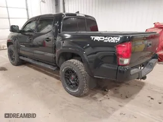 2016 Toyota Tacoma SR with VIN 3TMCZ5AN5GM027471, listed as a IAAI auction lot 41054774 with 74,864 mi miles. Bid and sale history available at carsss.com. Image 3.