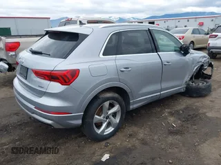 2021 Audi Q3 Premium with VIN WA1AUCF35M1131933, listed as a IAAI auction lot 41710739 with 93,293 mi miles and . Bid and sale history available at DreamBid. Image 4.