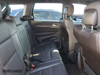 2014 Jeep Grand Cherokee Summit with VIN 1C4RJFJT4EC406899, listed as a Copart auction lot 42799245 with 168,575 mi miles and Salvage Title. Bid and sale history available at carsss.com. Image 10.