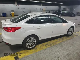 2017 Ford Focus Titanium with VIN 1FADP3J25HL213184, listed as a Copart auction lot 61653155 with 120,883 mi miles and Clean title. Bid and sale history available at DreamBid. Image 3.