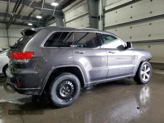 2016 Jeep Grand Cherokee Overland with VIN 1C4RJFCG9GC345309, listed as a Copart auction lot 61095285 with 115,968 mi miles and Salvage title. Bid and sale history available at DreamBid. Image 3.