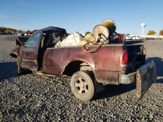 2001 Ford F-150 XL with VIN 1FTRF17L31NA34241, listed as a Copart auction lot 76045554 with Not provided miles and Salvage title. Bid and sale history available at DreamBid. Image 2.