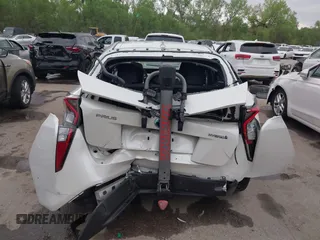 2017 Toyota Prius Two with VIN JTDKBRFUXH3036063, listed as a IAAI auction lot 42036676 with 202,873 mi miles. Bid and sale history available at carsss.com. Image 6.