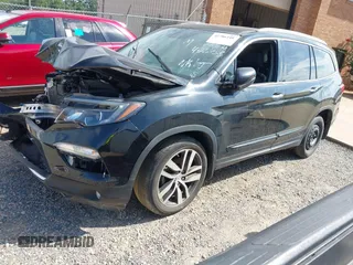 2017 Honda Pilot Touring with VIN 5FNYF5H91HB038268, listed as a IAAI auction lot 42786448 with 62,195 mi miles and . Bid and sale history available at DreamBid. Image 23.