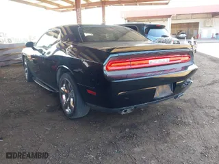 2013 Dodge Challenger SXT with VIN 2C3CDYAG1DH629087, listed as a IAAI auction lot 41993728 with 226,948 mi miles. Bid and sale history available at carsss.com. Image 3.