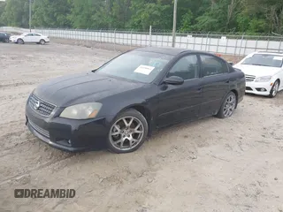 2005 Nissan Altima 3.5 SE with VIN 1N4BL11D95C250548, listed as a IAAI auction lot 42050063 with 176,734 mi miles. Bid and sale history available at carsss.com. Image 2.