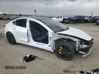 2019 Tesla Model 3 Mid Range with VIN 5YJ3E1EA8KF412886, listed as a Copart auction lot 50824565 with 54,803 mi miles and Salvage Title. Bid and sale history available at carsss.com. Image 4.