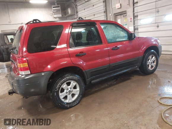 2005 Ford Escape XLT with VIN 1FMYU03115KA75972, listed as a IAAI auction lot 42058791 with 205,005 mi miles and . Bid and sale history available at DreamBid. Image 4.