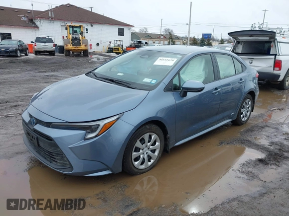 2023 Toyota Corolla Hybrid LE with VIN JTDBDMHE0P3005163, listed as a IAAI auction lot 41631670 with 10,956 mi miles. Bid and sale history available at carsss.com. Image 18.