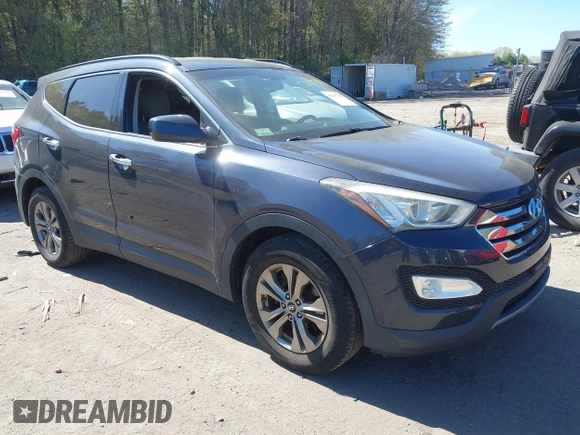 2014 Hyundai Santa Fe z VIN 5XYZUDLB1EG165458, wystawiony jako IAAI lot #42107789 z przebiegiem 94 395 mil mil oraz . Historia ofert i sprzedaży dostępna na DreamBid. Obrazek 1.