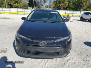 2023 Toyota Corolla LE with VIN 5YFB4MDE7PP044619, listed as a Copart auction lot 88971125 with 59,566 mi miles and Salvage Title. Bid and sale history available at carsss.com. Image 5.