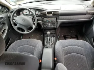 2003 Dodge Stratus SE z VIN 1B3EL36X73N517310, wystawiony jako Copart lot #69919714 z przebiegiem 107 394 mil mil oraz Nie do naprawy. Historia ofert i sprzedaży dostępna na DreamBid. Obrazek 8.