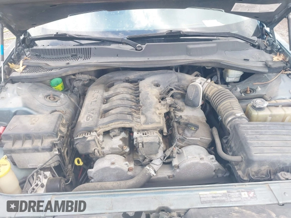 2005 Chrysler 300 with VIN 2C3AA53G55H186617, listed as a IAAI auction lot 42004943 with 230,956 mi miles. Bid and sale history available at carsss.com. Image 10.