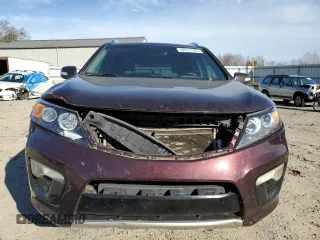 2011 Kia Sorento SX z VIN 5XYKW4A29BG156677, wystawiony jako Copart lot #42731225 z przebiegiem 245 581 mil mil oraz Czysty tytuł • Clean title. Historia ofert i sprzedaży dostępna na DreamBid. Obrazek 5.