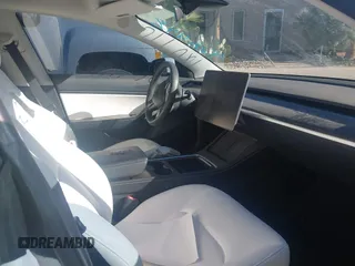 2021 Tesla Model 3 Performance with VIN 5YJ3E1EC6MF926448, listed as a IAAI auction lot 41240309 with 39,386 mi miles and . Bid and sale history available at DreamBid. Image 5.