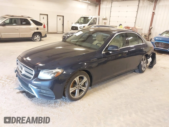 2018 Mercedes-Benz E with VIN WDDZF4KB7JA382850, listed as a IAAI auction lot 41991305 with 56,187 mi miles. Bid and sale history available at carsss.com. Image 2.