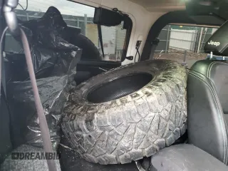 2017 Jeep Wrangler Sport z VIN 1C4AJWAG4HL563093, wystawiony jako Copart lot #51603125 z przebiegiem 105 618 mil mil oraz Szkoda całkowita • Salvage title. Historia ofert i sprzedaży dostępna na DreamBid. Obrazek 11.