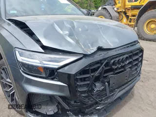 2021 Audi Q8 Premium Plus with VIN WA1EVAF14MD036327, listed as a IAAI auction lot 42237144 with 59,157 mi miles and . Bid and sale history available at DreamBid. Image 6.