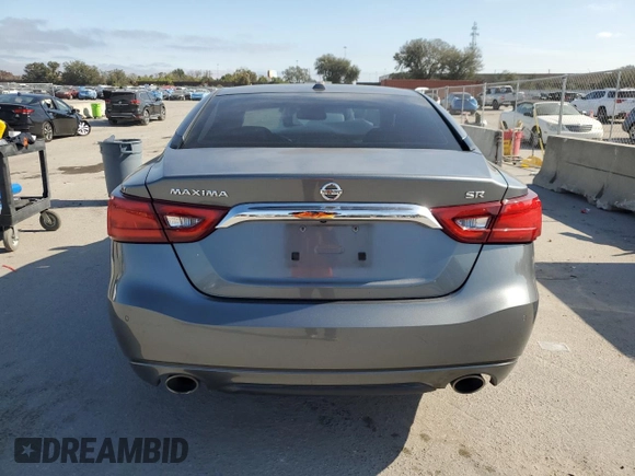 2016 Nissan Maxima S с VIN 1N4AA6AP9GC430964, выставлен на аукционе Copart как лот 85406374 с пробегом 143 020 миль миль и Списание • Salvage title. История ставок и продаж доступна на DreamBid. Изображение 6.