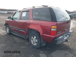 2001 Chevrolet Tahoe LT with VIN 1GNEK13TX1J281979, listed as a IAAI auction lot 41623086 with 297,509 mi miles. Bid and sale history available at carsss.com. Image 3.