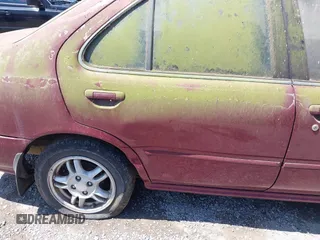 1999 Nissan Sentra XE with VIN 3N1AB41D0XL107458, listed as a IAAI auction lot 42536232 with 119,701 mi miles and . Bid and sale history available at DreamBid. Image 14.