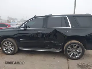2016 Chevrolet Tahoe LTZ z VIN 1GNSCCKC2GR100879, wystawiony jako IAAI lot #41112832 z przebiegiem 213 649 mil mil oraz . Historia ofert i sprzedaży dostępna na DreamBid. Obrazek 14.