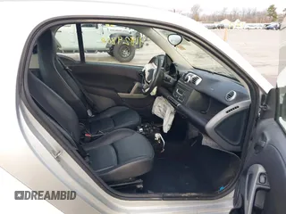 2013 Smart fortwo Pure with VIN WMEEJ3BA2DK702004, listed as a IAAI auction lot 41829808 with 53,545 mi miles and . Bid and sale history available at DreamBid. Image 5.