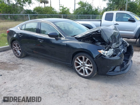 2016 Mazda Mazda6 i Touring with VIN JM1GJ1V53G1431880, listed as a IAAI auction lot 42079970 with 111,179 mi miles. Bid and sale history available at carsss.com. Image 1.