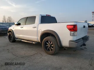 2013 Toyota Tundra Limited with VIN 5TFFY5F10DX146184, listed as a Copart auction lot 83433164 with 156,559 mi miles and Salvage title. Bid and sale history available at DreamBid. Image 2.