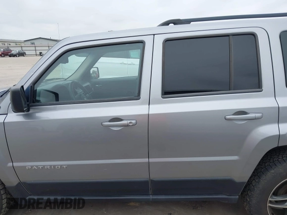 2015 Jeep Patriot Sport with VIN 1C4NJPBB3FD428835, listed as a IAAI auction lot 41637485 with 139,866 mi miles. Bid and sale history available at carsss.com. Image 14.