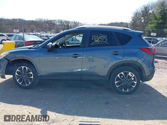 2016 Mazda CX-5 Grand Touring z VIN JM3KE4DY6G0785255, wystawiony jako IAAI lot #41887066 z przebiegiem 171 334 mil mil oraz . Historia ofert i sprzedaży dostępna na DreamBid. Obrazek 15.