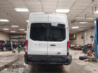 2017 Ford Transit z VIN 1FTYR3XM7HKA08504, wystawiony jako IAAI lot #41607977 z przebiegiem 621 328 mil mil oraz . Historia ofert i sprzedaży dostępna na DreamBid. Obrazek 17.