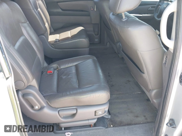 2012 Honda Odyssey Touring with VIN 5FNRL5H90CB099519, listed as a IAAI auction lot 41854550 with 185,110 mi miles. Bid and sale history available at carsss.com. Image 8.
