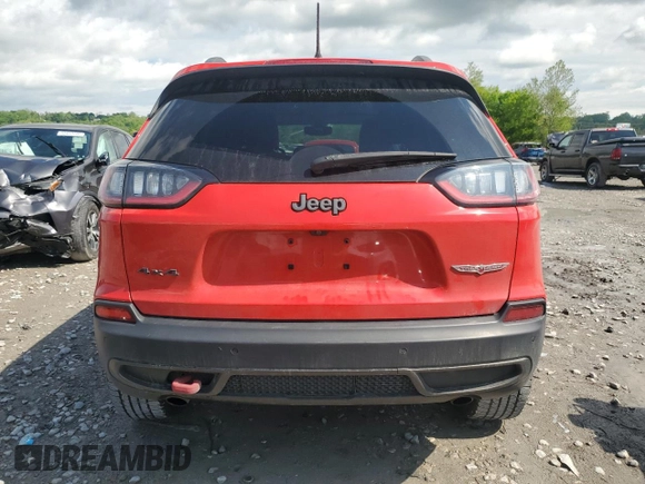 2019 Jeep Cherokee Trailhawk с VIN 1C4PJMBX3KD256495, выставлен на аукционе Copart как лот 56122695 с пробегом 98 786 миль миль и Списание • Salvage title. История ставок и продаж доступна на DreamBid. Изображение 6.