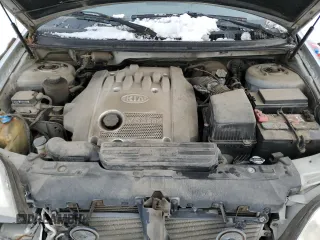 2005 Kia Sedona LX with VIN KNDUP131656722701, listed as a Copart auction lot 41604655 with 160,793 mi miles and Salvage Title. Bid and sale history available at carsss.com. Image 12.