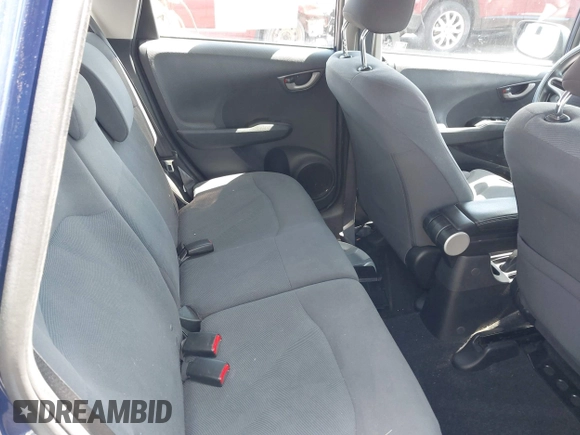 2013 Honda Fit with VIN JHMGE8H38DC047079, listed as a IAAI auction lot 42037073 with 32,794 mi miles. Bid and sale history available at carsss.com. Image 8.