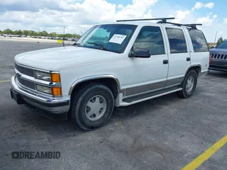 1995 Chevrolet Tahoe with VIN 1GNEC13K9SJ414611, listed as a IAAI auction lot 42798752 with 205,988 mi miles and . Bid and sale history available at DreamBid. Image 2.