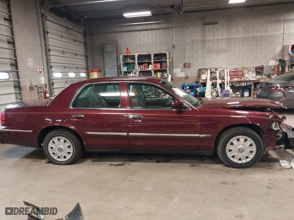 2004 Mercury Grand Marquis GS with VIN 2MEFM74W44X660876, listed as a IAAI auction lot 41915559 with 138,546 mi miles. Bid and sale history available at carsss.com. Image 13.