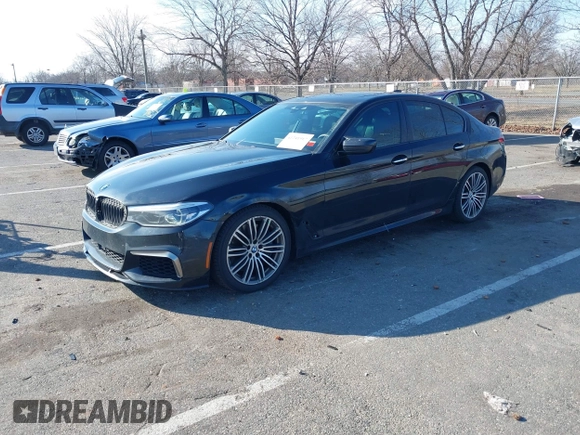 2018 BMW 5 Series M550i xDrive with VIN WBAJB9C55JB049529, listed as a IAAI auction lot 41241917 with 116,265 mi miles and . Bid and sale history available at carsss.com. Image 17.