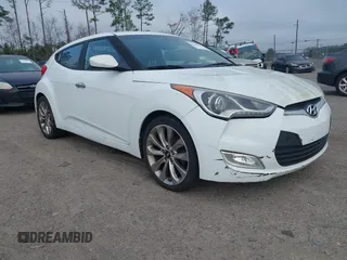 2014 Hyundai Veloster with VIN KMHTC6ADXEU213073, listed as a IAAI auction lot 41551346 with 130,549 mi miles. Bid and sale history available at carsss.com. Image 1.